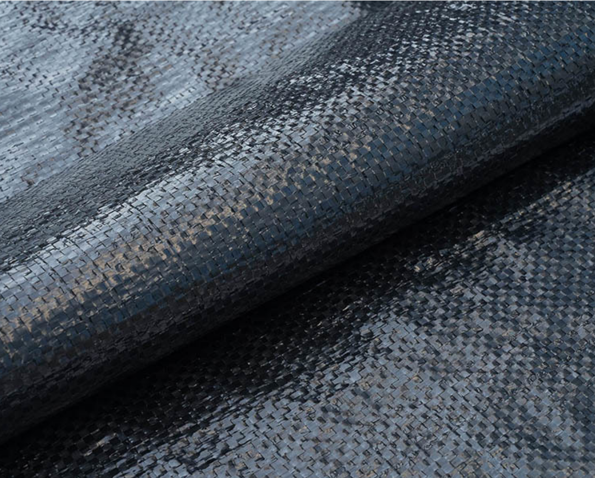 Weed control fabric is a geotextile covering material laid on the surface of soil to prevent weed growth.